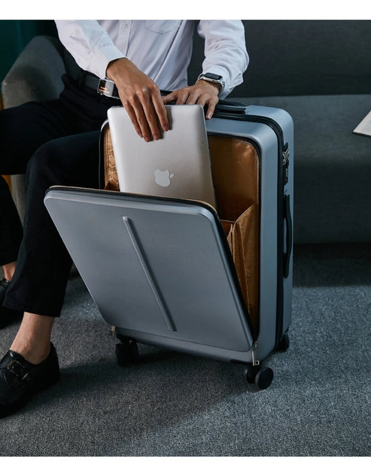 Rolling travel suitcase with laptop compartment